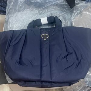 Cle de Peau navy blue Tote Bag with Gold Logo. Great travel bag